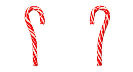 Two red and white striped candy canes isolated on black background, traditional Christmas sweets perfect for holiday decorations and festive celebrations