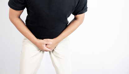 Erectile dysfunction concept. Close up of man holding his crotch. Men's health. Man holding...