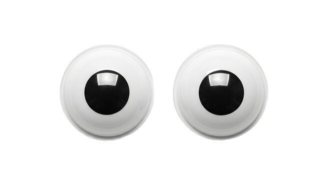 Pair of black and white plastic googly eyes isolated on white background, perfect for crafts and DIY projects