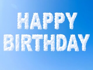 Fototapeta premium Happy Birthday Written with Clouds on a Clear Blue Sky Day