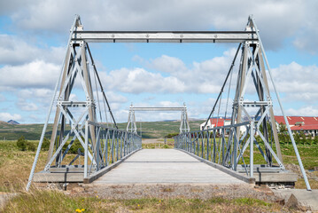 Fototapeta premium Bridge Over Ornolfsdalsa in Iceland on a sunny summer day