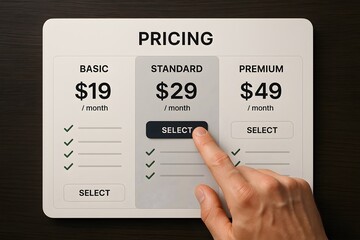 A pricing chart with a finger touch for the concept of choosing a plan.