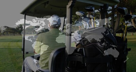 Sitting friends chatting in canopy-roofed golf cart on fairway, with attached golf bag of clubs