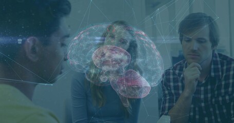 Presenting professionals analyzing holographic brain model at meeting table, with glowing network