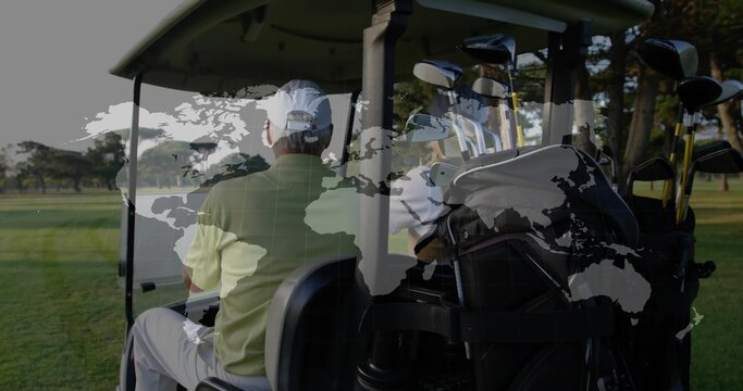 Sitting friends chatting in canopy-roofed golf cart on fairway, with attached golf bag of clubs