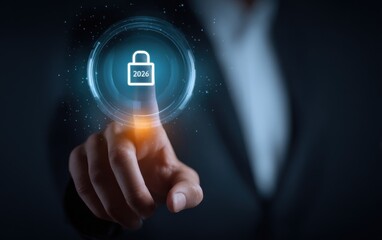 Businessperson touching glowing blue lock with 2026, representing cyber security, data protection, future privacy and business safety concept.