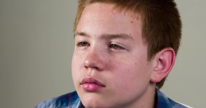 Young boy tracking computer screen with eyes 4k