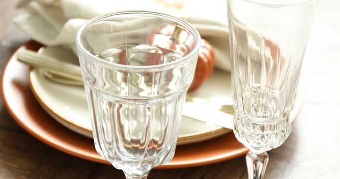 Beautiful table setting with autumn decor on wooden background, closeup