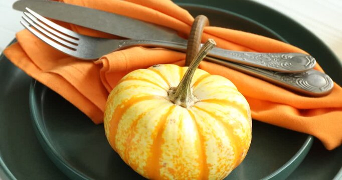 Beautiful table setting with autumn decor on white wooden background, closeup