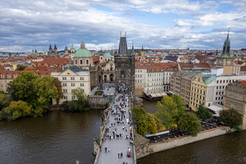 Obraz premium Beautiful Aerial view of the Old Town Bridge Tower, the Charles Bridge (Karlův most) and the City of Prague