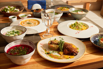 Indulge in a Gourmet Culinary Experience Featuring an Array of Assorted Dishes and Beverages