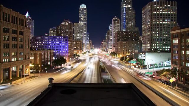 Night cityscape view with blurred car lights on a city street