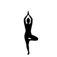 Fototapeta premium Silhouette of a woman in tree pose for yoga and meditation representing balance and wellness