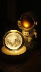 figurine of an astronaut in a white costume