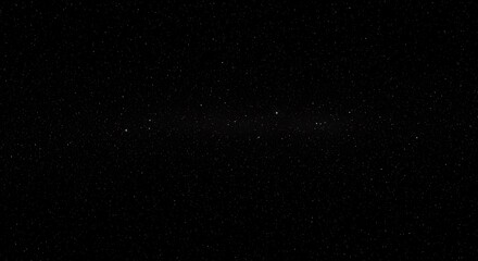 Obraz premium Endless night sky glowing with countless stars in peaceful beauty.