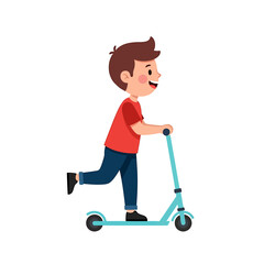 A cheerful young boy rides a scooter, enjoying an outdoor activity.