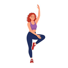 Woman in athletic wear balancing on one leg with arm raised, in a yoga or dance pose.