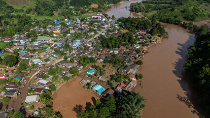 Aerial view of Karen Ruammit Elephant Camp village in Chiang Rai province of Thailand flooded after Kok river rising.
