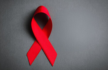 World AIDS Day with Red Ribbon, Gray Background.