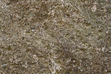 茶色い石のざらざらした表面のクローズアップ。石や岩のテクスチャー