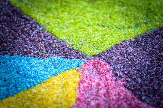 Coloured rice arranged in a piece-of-pie pattern - horizontal