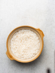 Overhead view of boiled rice in a claypot, top view of cooked rice in a donabe