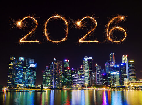 2026 Happy New Year fireworks over Singapore cityscape at night