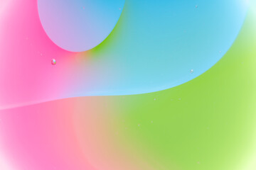 Pink and Green Abstract Macro Photography of Fluid Oil and Water Swirls