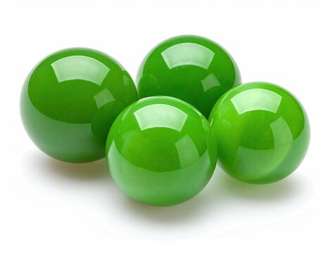 Four glossy, bright green spheres clustered on white