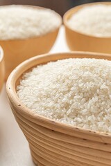 Bowls of Uncooked White Rice Grains, stock photo