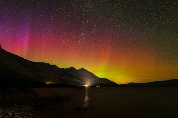 Aurora Borealis glowing in the night sky © hashlina