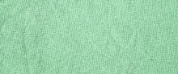 Green cotton fabric texture background, Wrinkle surface textile, wallpaper, banner