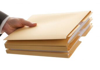 Hand holding manila folders isolated on a transparent background