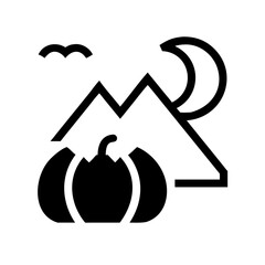Pumpkin with mountain and moon silhouette