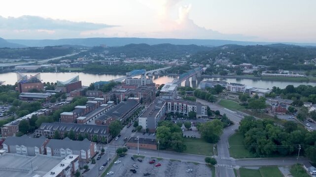 Chattanooga neighborhood and  Tennessee River at sunset - aerial flyover