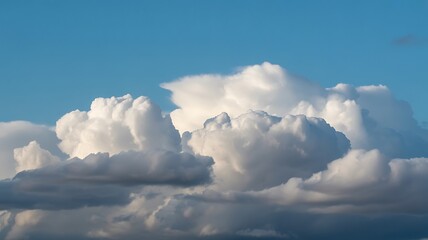 Fluffy Cumulus Clouds – White Cloud Formations in Clear Blue Sky