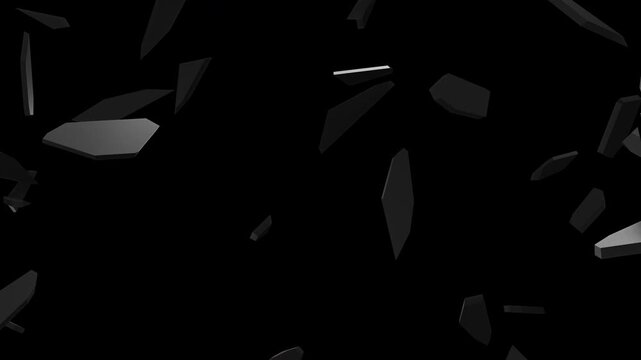 Pieces of matte black wall shatter and float in different patterns on an alpha background.