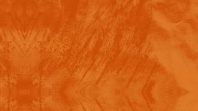 Abstract textured orange background with grunge elements and artistic brushstroke effects