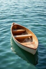 Obraz premium Small Wooden Rowboat on Calm Water