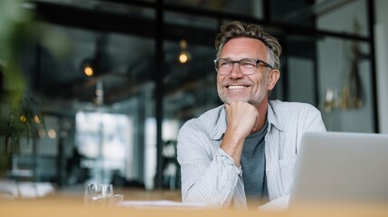 Man smiling contemplating successful business ideas