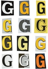 Assortment of colorful cut out letter gs on white background