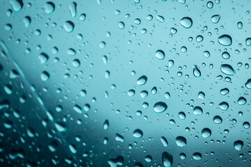 Raindrops on Glass with Blue Light – Abstract Texture Background