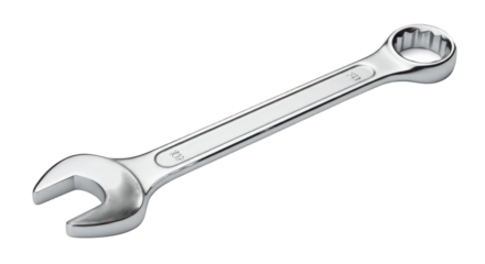 Gleaming wrench rests on metallic surface