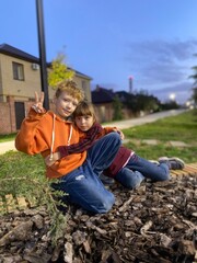 Sister and brother on a bench