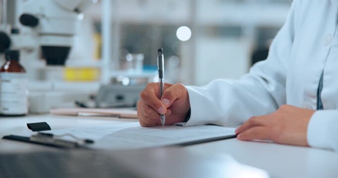 Scientist, hands and writing on clipboard in lab for experiment data, sample test results or report. Science, person and checklist for medical research, vaccine notes and pharmaceutical innovation