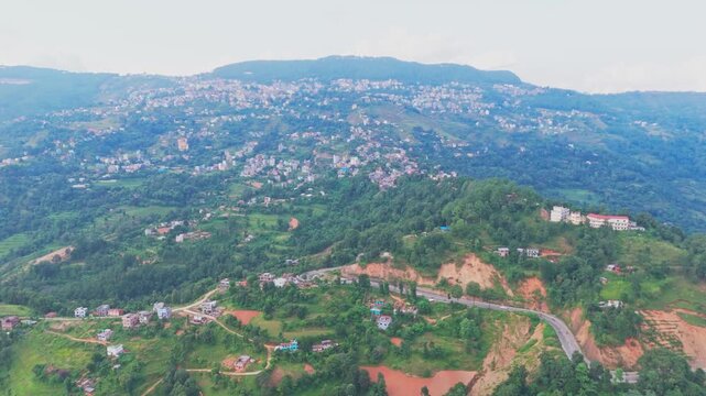 Aerial drone footage of Tansen, Palpa hill station in Nepal, showcasing panoramic mountain views, traditional houses, and the serene beauty of this historic hillside town.