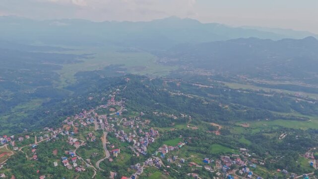 Beautiful hillside view of Tansen Palpa, Nepal, showcasing green mountains, traditional houses, and the peaceful charm of this historic hill town surrounded by nature.