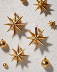 Fototapeta premium Minimal still life with gold star ornaments on white background, symbolizing celebration and festivity.
