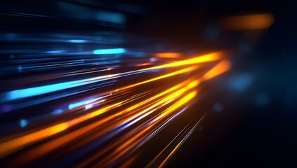 Abstract streaks of vibrant blue and orange light blur across a dark background creating a sense of rapid motion and futuristic energy flow