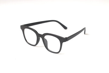 Pair of glasses with black frame on isolated white background.